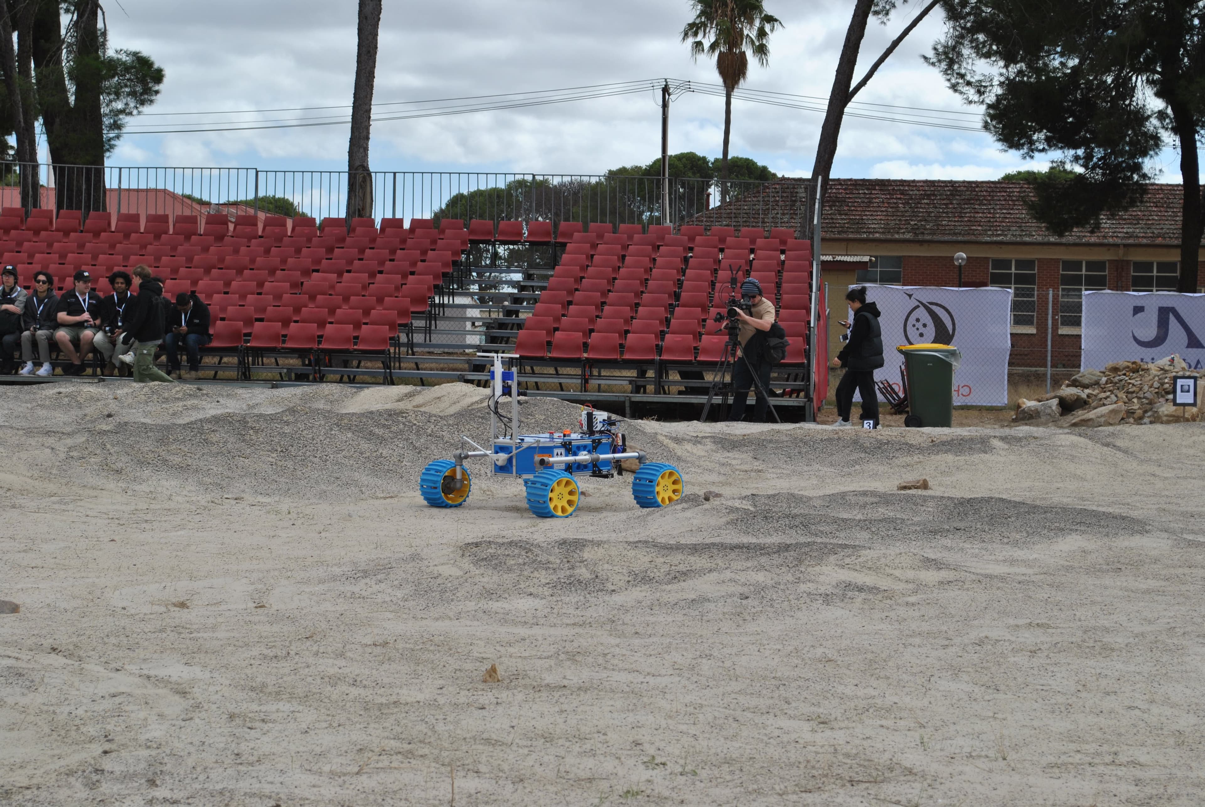 The WARP rover navigating the competition arena at ARCh